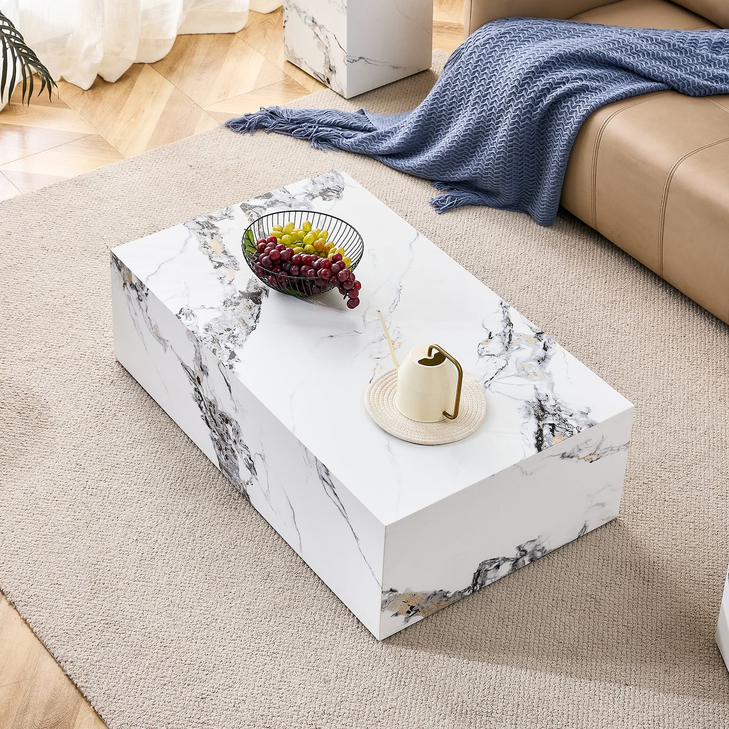 A stylish and durable design paired with a modern 3 piece coffee table set with marble patterns.