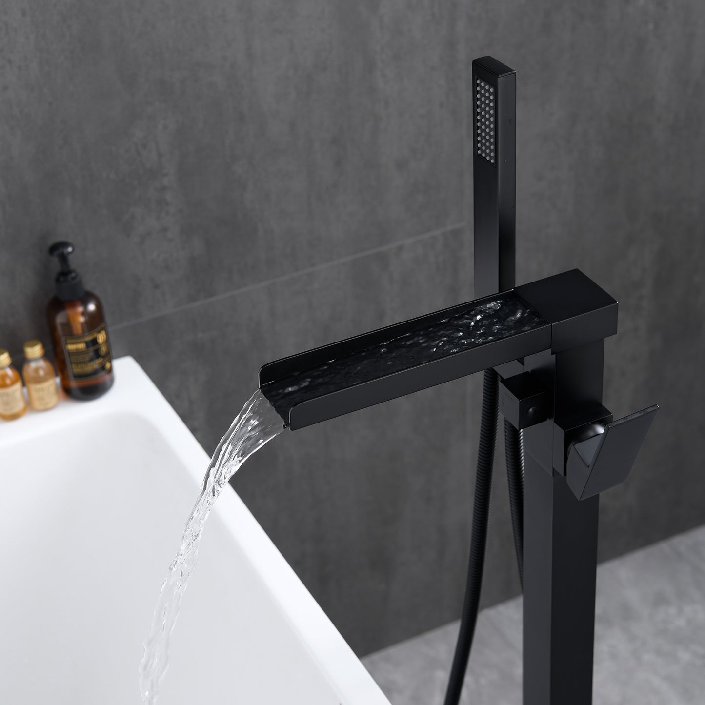 Single-Handle Freestanding Floor Mount Roman Tub Faucet Bathtub Filler with Hand Shower in Matte Black