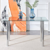 Modern minimalist glass dining table. A transparent tempered glass desktop with a thickness of 0.3 feet and silver metal legs. Suitable for restaurants and living rooms.   51"*31.4"*29.5"