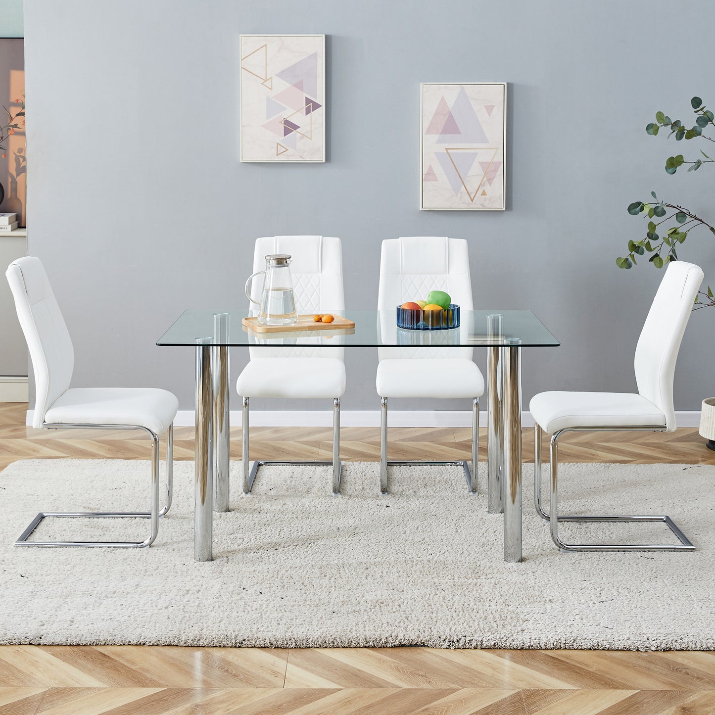 Modern minimalist glass dining table. A transparent tempered glass desktop with a thickness of 0.3 feet and silver metal legs. Suitable for restaurants and living rooms.   51"*31.4"*29.5"