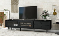 ON-TREND Chic Elegant Design TV Stand with Sliding Fluted Glass Doors, Slanted Drawers Media Console for TVs Up to 75", Modern TV Cabinet with Ample Storage Space, Black