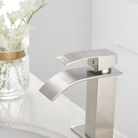 Waterfall Single Hole Single-Handle Low-Arc Bathroom Faucet With Pop-up Drain Assembly in Brushed Nickel