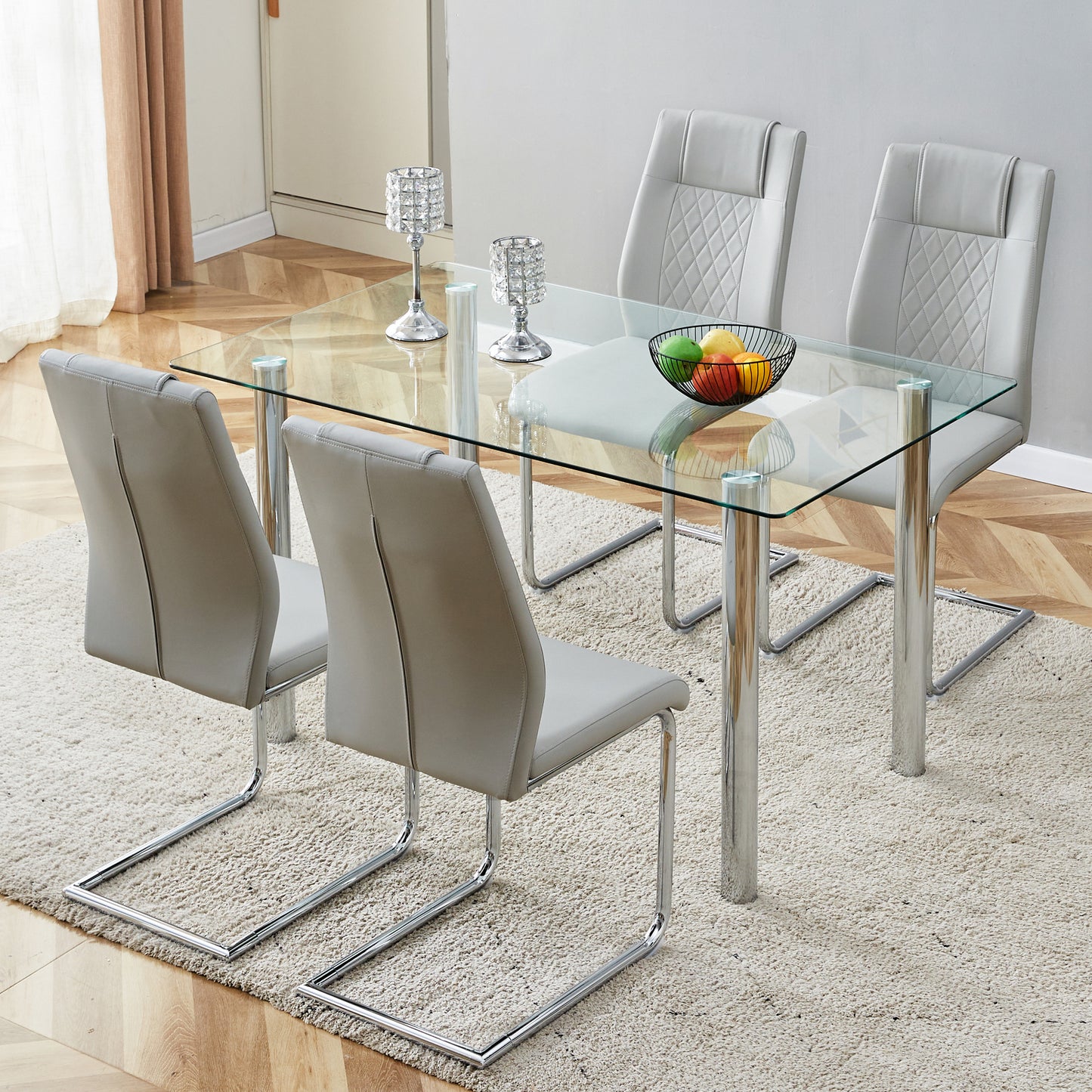 Modern minimalist glass dining table. A transparent tempered glass desktop with a thickness of 0.3 feet and silver metal legs. Suitable for restaurants and living rooms.   51"*31.4"*29.5"