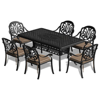 7-Piece Set Of Cast Aluminum Patio Furniture With Black Frame and Seat Cushions In Random Colors